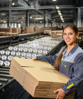Worker placing cardboard stacks on a conveyor with 5/8" Roller Ball Transfer Bearing, 120PCS CY-15H Carbon Steel Ball Bearing Rollers