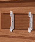 Set Of 10 False Front Cabinet Clips With Screws For Four And A Half Inch Drawer Fronts installed on a wooden cabinet surface.