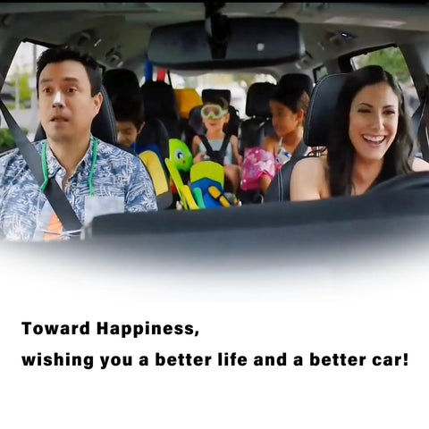 Family seated in a car smiling and enjoying a drive with children in the back seat.
