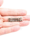 Fast-Blow Mini Fuse F2.5AL, 2.5A 125V Glass Fuse, 10 Pack, small fuses in hand, durable glass material visible