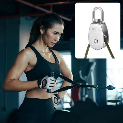 2pcs M50 Double Pulley Block, Stainless Steel Swivel Rigging Lifting Wheel Fixed Pulley in gym setup with woman exercising