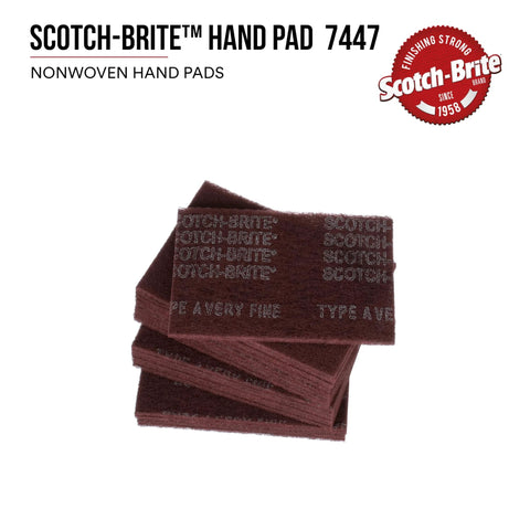 Stack of 3M Scotch-Brite very fine aluminum oxide hand pads for scuffing and cleaning, size 6x9 inches, general purpose use.