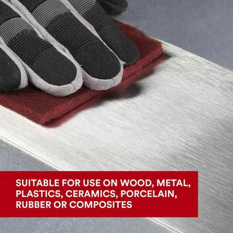 General Purpose Very Fine Aluminum Oxide Hand Pad For Scuffing And Cleaning 6x9 being used on metal surface
