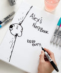 Fine point permanent markers deliver bold, precise lines with quick-drying, odorless ink used on a notebook cover labeled "Alex's Notebook".