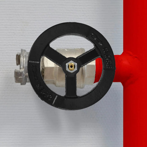 Directional Wheel Indoor Fire Hydrant Handwheel 4.72 Inch Valve Handle Replacement installed on red fire hydrant pipe