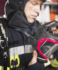 Firefighter adjusting mask with Mask Quick Release Clip With Leather Handle For Firefighter And Marine Rigging Marine Grade 316 Stainless Steel Snap Shackle attached to gear.