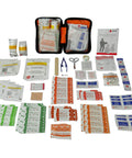 Four Person 72 Hour Deluxe Emergency Kit Backpack With First Aid Gear showing open first aid kit and supplies.