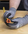 Electrician using Five In One Cable Stripping Tool For 12 To 14 AWG NM Cable Jacket Slitting And Precision Insulation Stripping