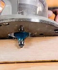 Fixed Base Router 2.25 HP 12 Amp Variable Speed 8000 to 25000 RPM used for precise edge work on wood surface.