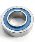 Close-up of 4 Pack Sealed Flanged Ball Bearings For Lawn Mowers And Outdoor Carts, Chrome Steel, with blue seal.