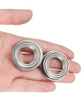 F6804ZZ Flanged Ball Bearing With Double Shielding 20x32x7mm Chrome Steel held in a hand showing size and design