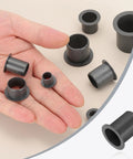 Hand holding six pack flanged sleeve bearings 17mm ID 19mm OD 25mm length POM plastic bushing black with 25mm flange 1mm thick