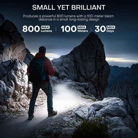 Person using compact USB C rechargeable EDC flashlight delivers 800 lumens with a bright main beam and a handy side light hiking at night