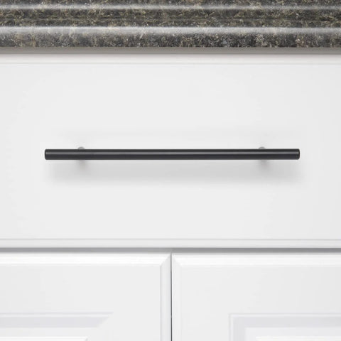 Euro Bar Cabinet Pull Handle Flat Black Finish Three Eighths Inch Diameter Eight Point Six Nine Inch Length Center To Center Six Point Three One Inch With Mounting Hardware Included Ten Pack installed on white cabinet
