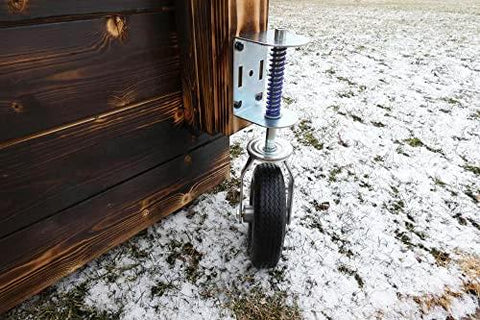 Heavy Duty Flat Free Spring Gate Caster With Universal Mount Eight Inch Wheel on wooden gate outdoors