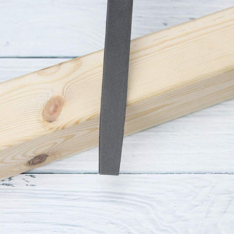 Flat Hand File With Double Cut Teeth For Wood And Metal In High Carbon Steel Designed For Shaping Deburring Smoothing And Finishing Projects Seven Point Five Inch Overall Length Six Inch File Length Six Tenths Of An Inch Wide Without Handle filing wood surface