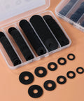 120Pcs Flat Rubber Washers Set in 5 Sizes 16 18 20 25 30mm Black Sealing Washers in storage box, assorted sizes displayed on table