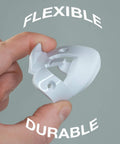 Person holding flexible and durable Door Silencer Strike Plate That Quietly Fixes Loud Latches And Stops Slamming