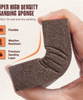 Hand bending flexible sanding sponge demonstrating flexibility of Sanding Sponge 4 Pack 60 80 120 220 Grit Wet Dry Sanding Blocks with Gloves.