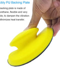 Hand holding yellow round 5-inch hand sanding block with hook and loop disc, ergonomic for precise control.
