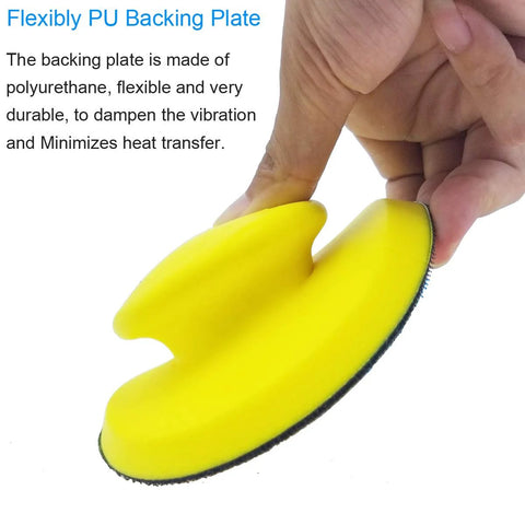Hand holding yellow round 5-inch hand sanding block with hook and loop disc, ergonomic for precise control.