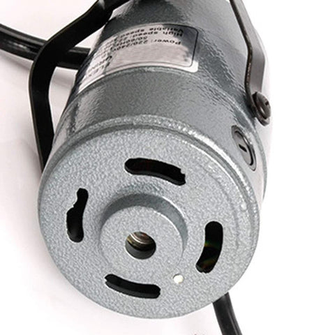 Close-up of the motor component from Flexible Shaft Grinder Carver Rotary Tool Set With Hanging Overhead Motor And 30 Piece Attachments
