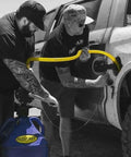 Two men using FLO-FAST Pro Pump, 8GPM, Telescoping Draw Tube, fits Containers and Barrels, Portable, Durable, Made in USA.
