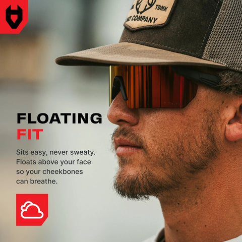 Side view of a man wearing ANSI Z87 Safety Glasses With High Contrast Lenses, anti-scratch, floating fit, UV protection, outdoors.