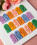 7 Piece Soft Clay Leaf Cutter Mold Set For Flower Stamps And Floral Earrings Making Tools Jewelry Craft Kit For DIY Artists Plastic Jewelry Molds displayed on a pink surface