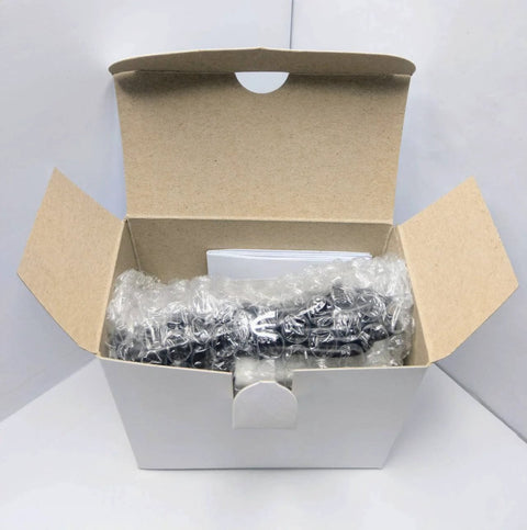 Open box containing Flow Totalizer And Flow Meter For Three Quarter Inch NPT Water Filter Systems with bubble wrap packaging