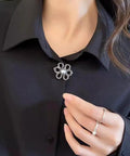 Flower Jeans Button Sets Ten Pcs Adjustable Waist Tighteners Buckles No Sew No Tools Detachable Decorative Jeans Buttons Pins For Loose Jeans Pants And Skirts Durable Metal Construction Universal Fit Ten Color Options Black Gray Silver Light Gold Frosted shown on black shirt.