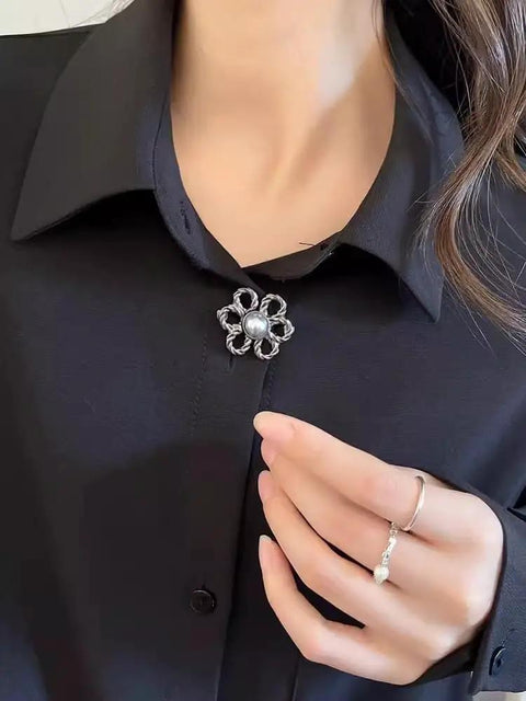 Flower Jeans Button Sets Ten Pcs Adjustable Waist Tighteners Buckles No Sew No Tools Detachable Decorative Jeans Buttons Pins For Loose Jeans Pants And Skirts Durable Metal Construction Universal Fit Ten Color Options Black Gray Silver Light Gold Frosted shown on black shirt.