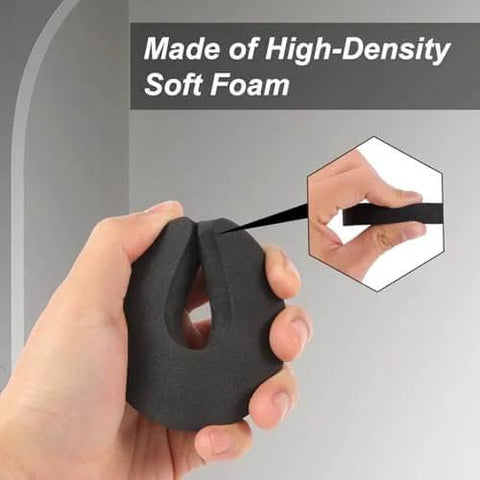 Hand holding high-density foam piece from Eight Piece Foam Door Stopper And Pinch Guard Set For Kidproof And Pet Safety Easy Install