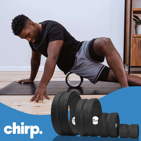 Man using density foam roller with built in spine channel for targeted back and neck relief, 4-pack shown below
