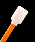 Close-up of Large Rectangular Foam Cleaning Swab Stick with orange handle and white tip for electronics and printer cleaning.