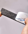 Heavy Duty No Fuss Double Sided Foam Tape Kit with Waterproof Adhesive Mounting Tape being peeled, showing adhesive backing