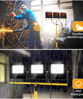 Ultra Bright 36000 Lumen LED Work Light With 3 Foldable Heads On A Sturdy Stand 16 Ft Cord IP67 Waterproof Tripod in use