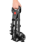Hand holding folded ✝️ Photography Tripod Dolly, Heavy Duty 50lbs Capacity Tripod Wheels with 3" Rubber Wheels for DSLR Cameras