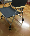 Chair on wooden floor using adjustable swivel feet levelers for stable height, featuring carbon steel with nylon base and rubber pad.