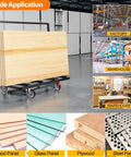 Folding Drywall Dolly With 5 Inch Swivel Casters 2000 Lbs Load Capacity Portable Panel Cart in use, handling plywood in a warehouse.