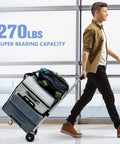 Person using 270LBS Utility Luggage Cart with 4 Wheels, 100% Aluminum Hand Truck Dolly, carrying stacked luggage in an airport.
