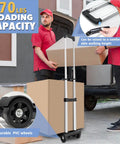 Man using ✝️ Folding Hand Truck Aluminum Trolley,Small Dolly, Foldable Hand Cart Collapsible with 70 lbs capacity to load boxes