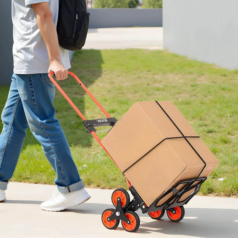 Man using Stair Climbing Cart 260 LBS, Portable Folding Aluminum Trolley Dolly for Stairs with box, 6 Mute Wheels, outdoor setting