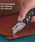 Close-up of a 3 Pack Folding Utility Knife Set With Zinc Alloy Body, Quick Change Blades being used to cut leather, highlighting versatility.