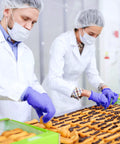 Workers handling food wearing Heavy Duty Nitrile Gloves Disposable Powder Free Latex Free Rubber Free Ultra Strong For Food Handling