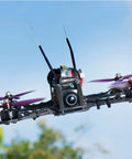 FPV quadcopter in flight showcasing Aluminum Knurled Spacer Standoff M3 X 8mm Pack Of 100 For RC Drones And FPV Quadcopters Black 5mm OD