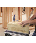 Framing hammer with a 23 oz milled head and nail starter grips nails flush for wood framing, decks, straight claw, in use.