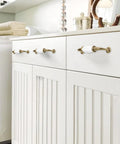 French Style White Ceramic Cabinet Handle Set Of 2 With Zinc Alloy Pulls And Screws For Cupboards Wardrobe Drawers And Dresser Retro Furniture Hardware With 3.7 Inch Center To Center Spacing installed on white cabinet drawers.
