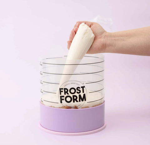 Applying frosting using 6 Inch Frost Form Starter Kit For Cake Decorating 7 Piece Set With Liner Form Base Stand Crumb Cutter Finisher