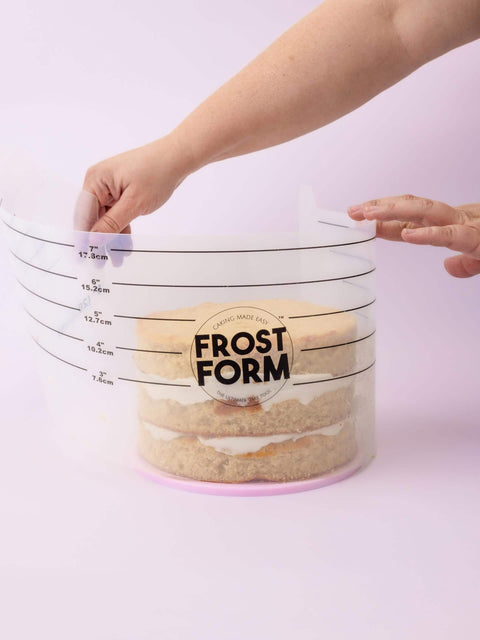 6 Inch Frost Form Starter Kit For Cake Decorating 7 Piece Set with liner shown being used on a cake